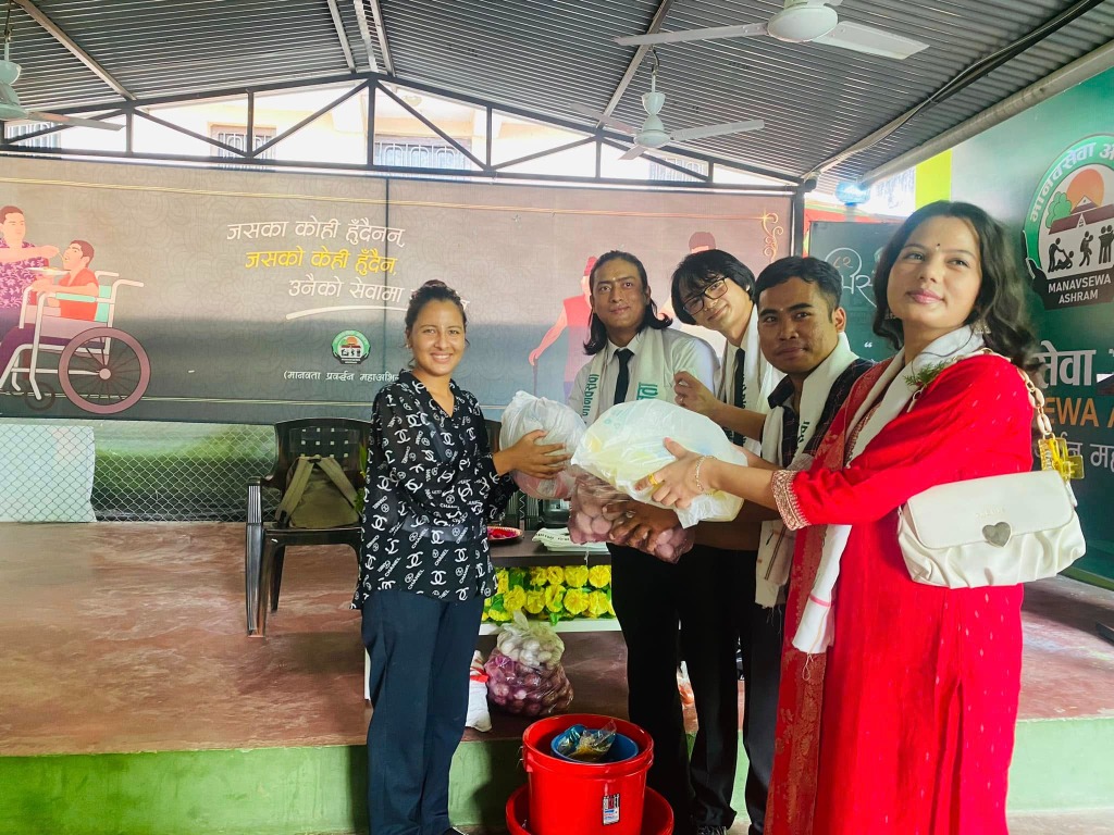 Twist Academy team and students donating food supplies at Manavsewa Ashram