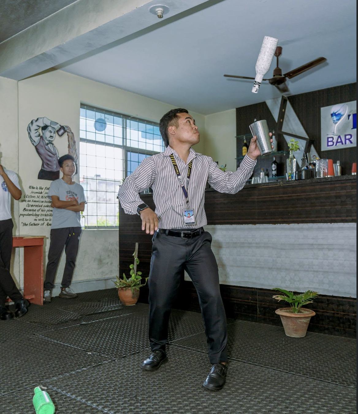 Bartender performing flair bartending skills